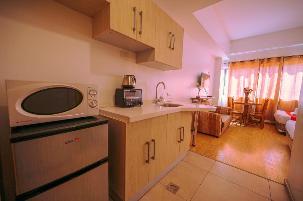 Kuchyň nebo kuchyňský kout v ubytování Cedar Peak Condominium by Tripsters Hub