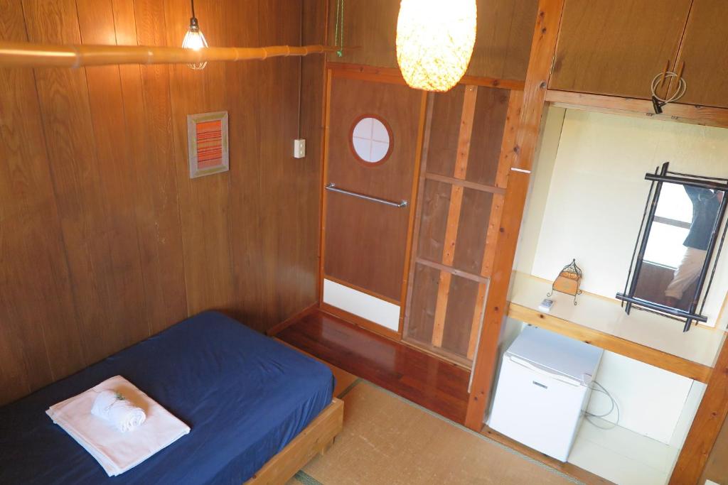 Postel nebo postele na pokoji v ubytování Hotel Hibiscus