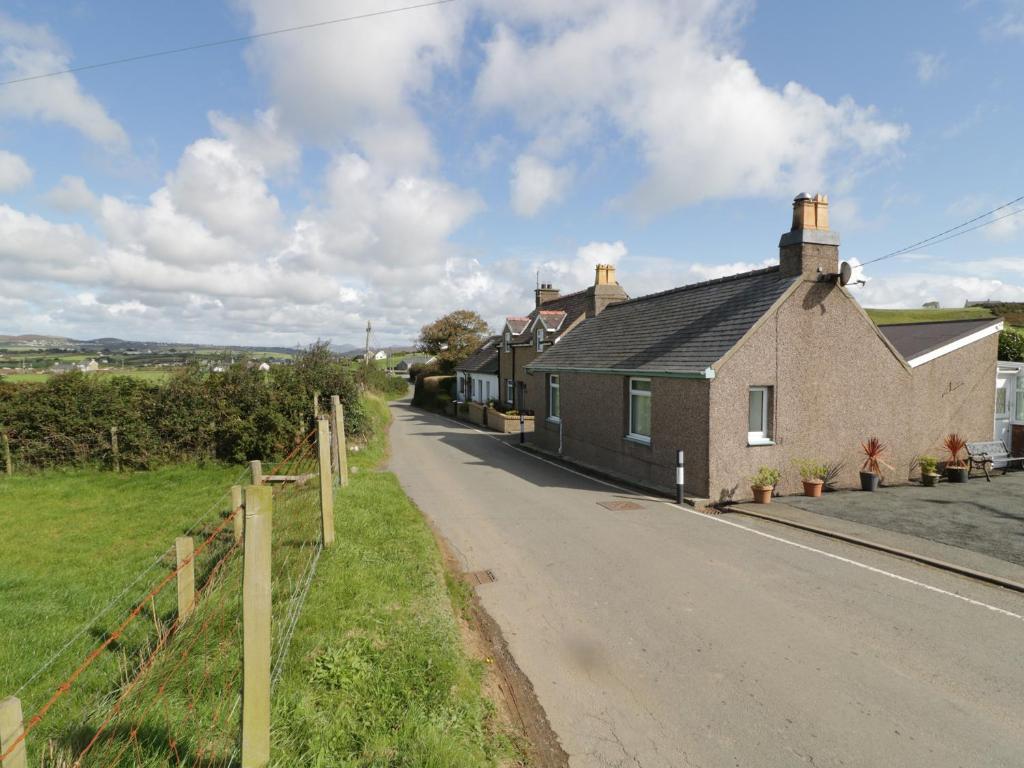 a house on the side of a road at Trigfa Cottage in Abersoch
