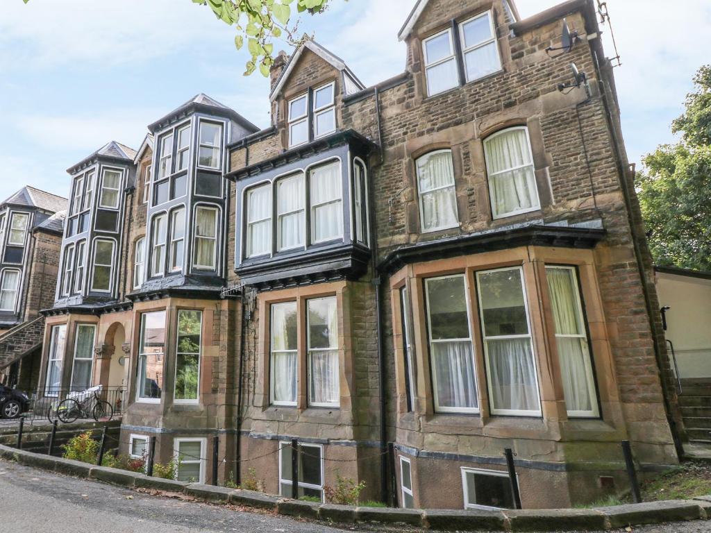 an old brick house on the corner of a street at The Haven in Buxton