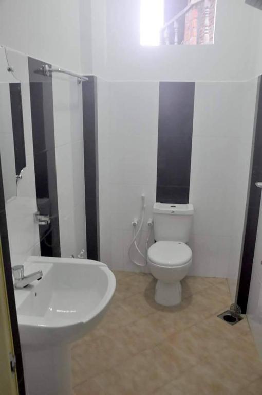 Koupelna v ubytování Dinimuthu Rest Inn
