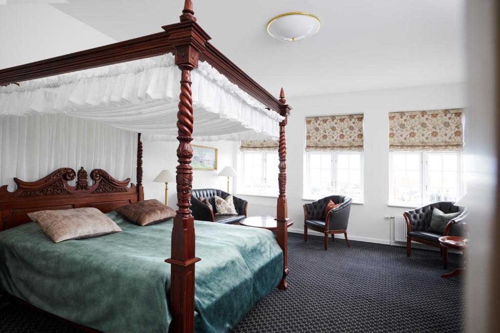 Postel nebo postele na pokoji v ubytování Tornøes Hotel