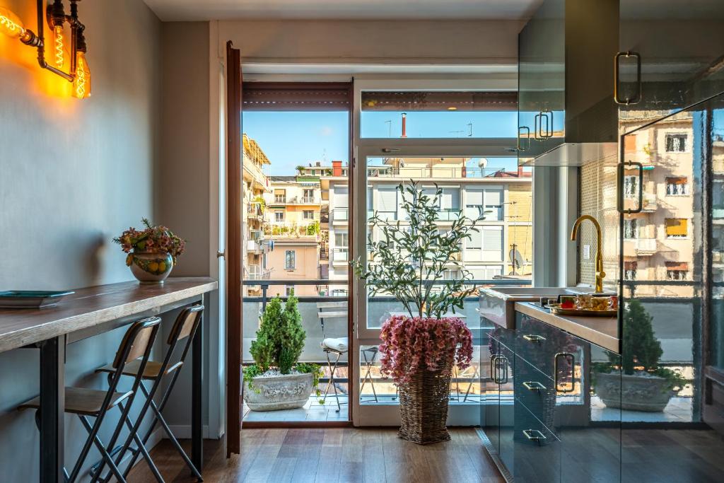 a kitchen with a view of a city at B&B il Duca d'Amalfi in Salerno