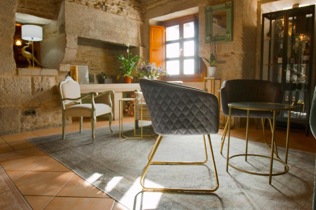 Posedenie v ubytovaní Hostal Pension Artilleiro