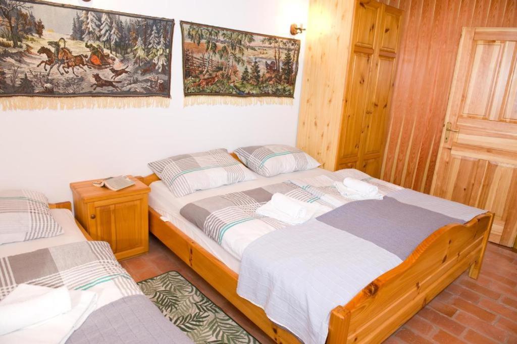 Postel nebo postele na pokoji v ubytování PLANINCA -hiša z razgledom