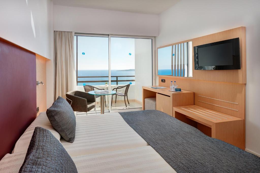 Televízia a/alebo spoločenská miestnosť v ubytovaní CM Playa del Moro