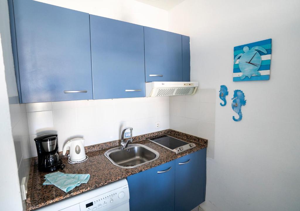 Kuchyň nebo kuchyňský kout v ubytování Sea Breeze Apartment 309