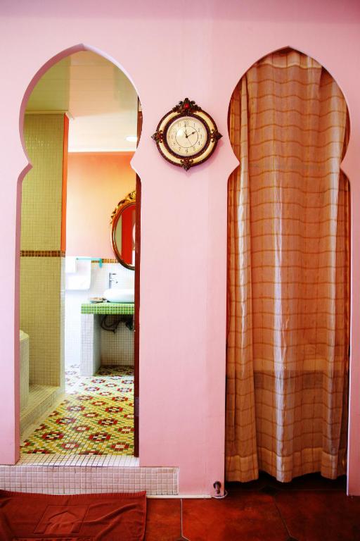 Postel nebo postele na pokoji v ubytování Raid Garden Boutique Hotel