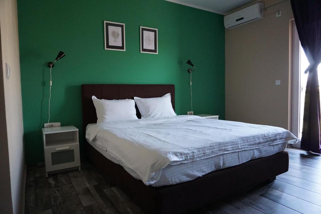 Postel nebo postele na pokoji v ubytování Guesthouse & restaurant Tekovina