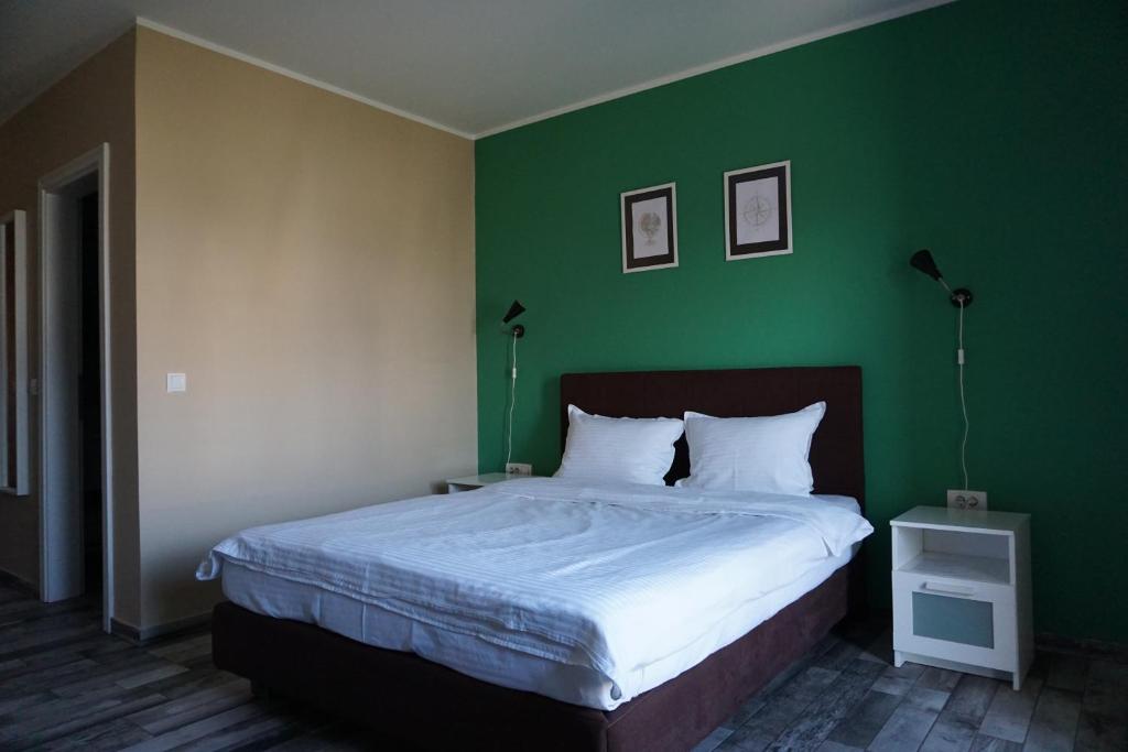 Postel nebo postele na pokoji v ubytování Guesthouse & restaurant Tekovina