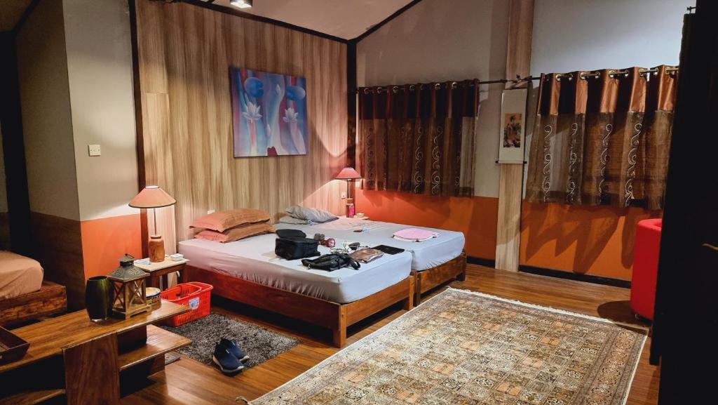 Кровать или кровати в номере Cocoville