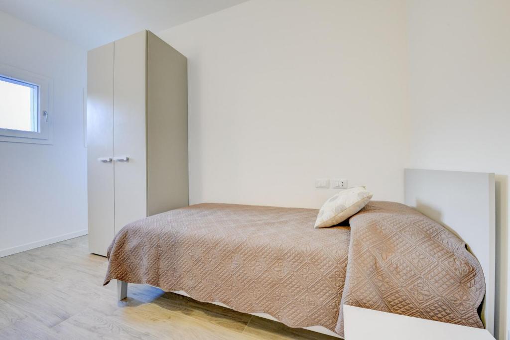 A bed or beds in a room at Maison Bellini number 3