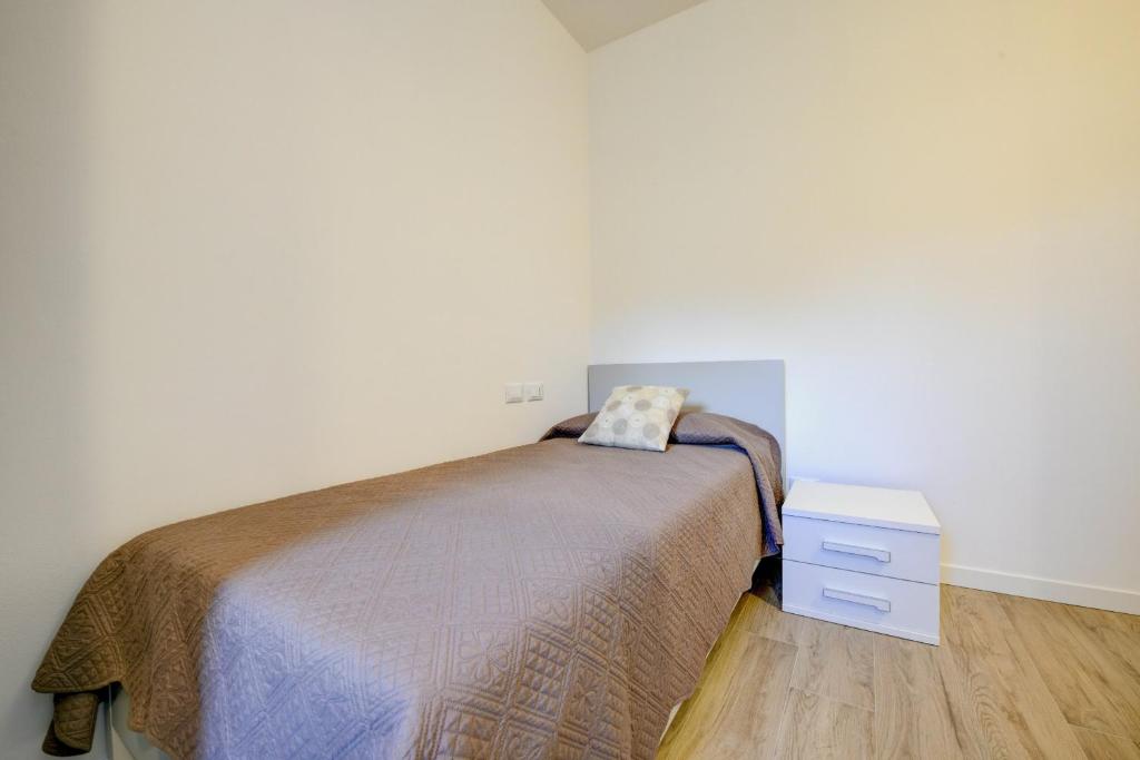 A bed or beds in a room at Maison Bellini number 3