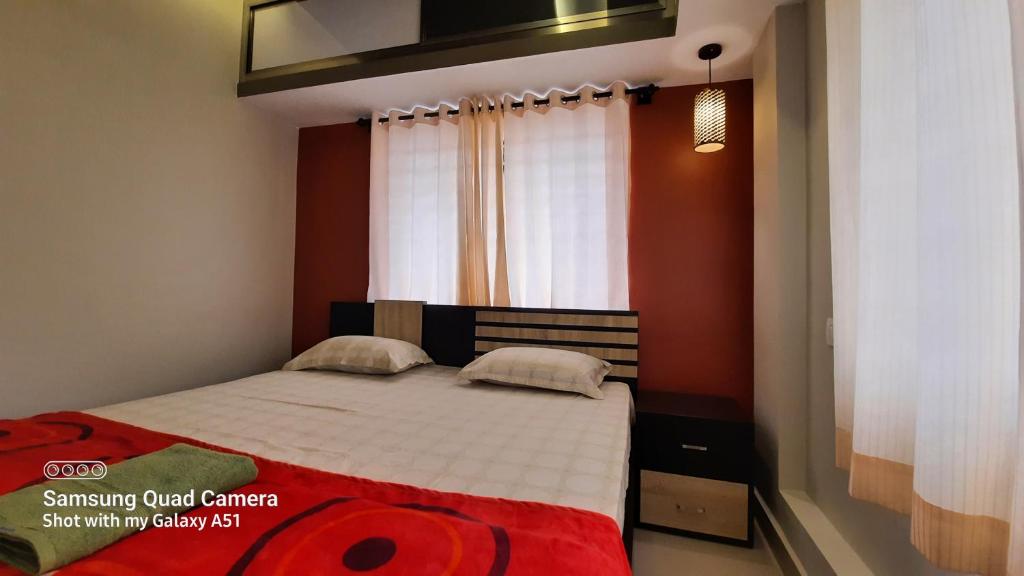 Postel nebo postele na pokoji v ubytování Varam Homestay