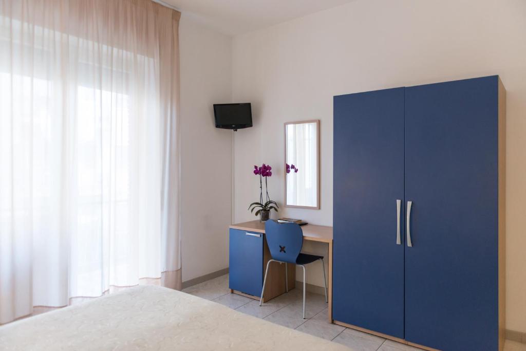 TV a/nebo společenská místnost v ubytování Hotel Viola