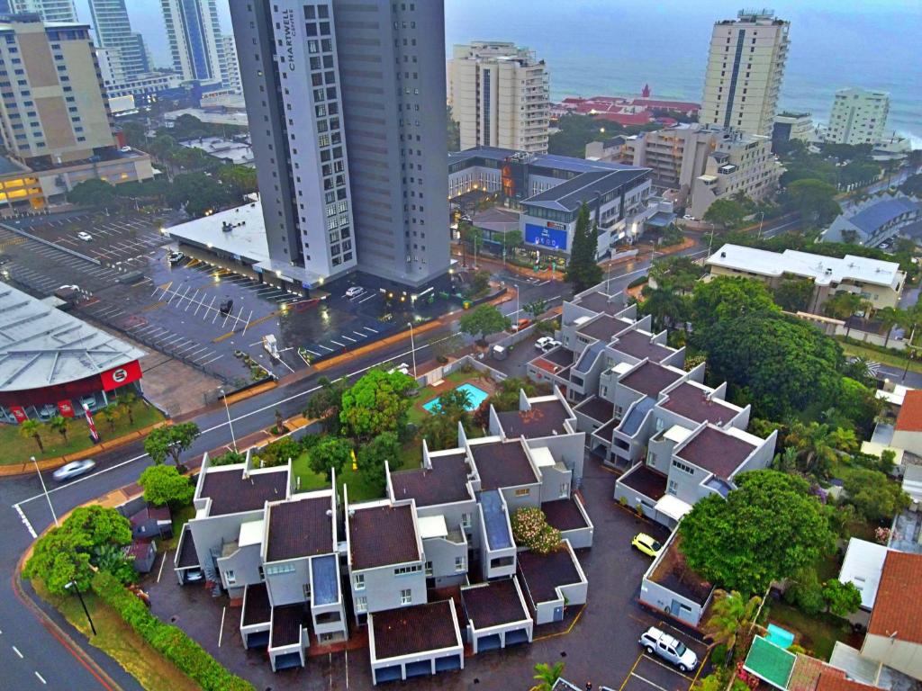 an aerial view of a city with buildings and a street at Ocean Villa in Durban