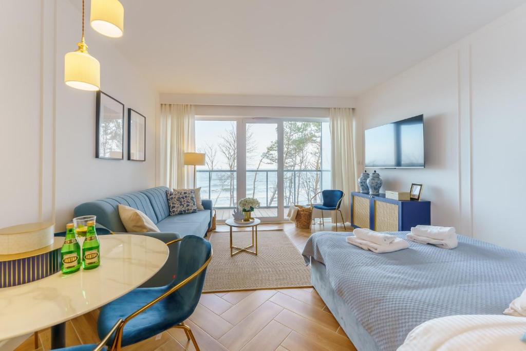 Ένα ή περισσότερα κρεβάτια σε δωμάτιο στο Sunnyway Apartment
