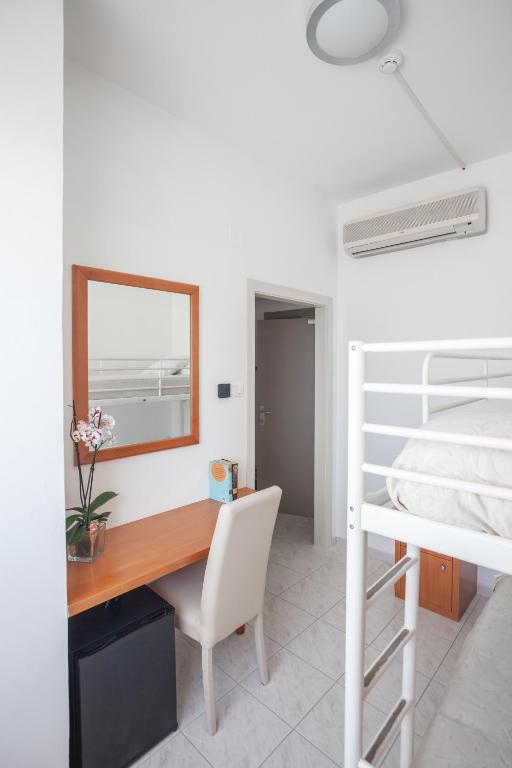 Postel nebo postele na pokoji v ubytování Hotel Viola