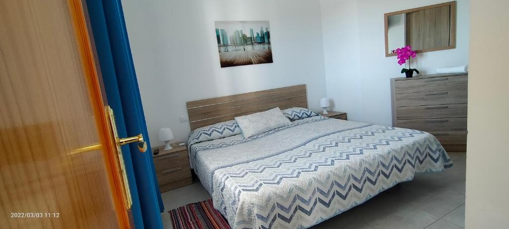 Postel nebo postele na pokoji v ubytování Holla del Saldo