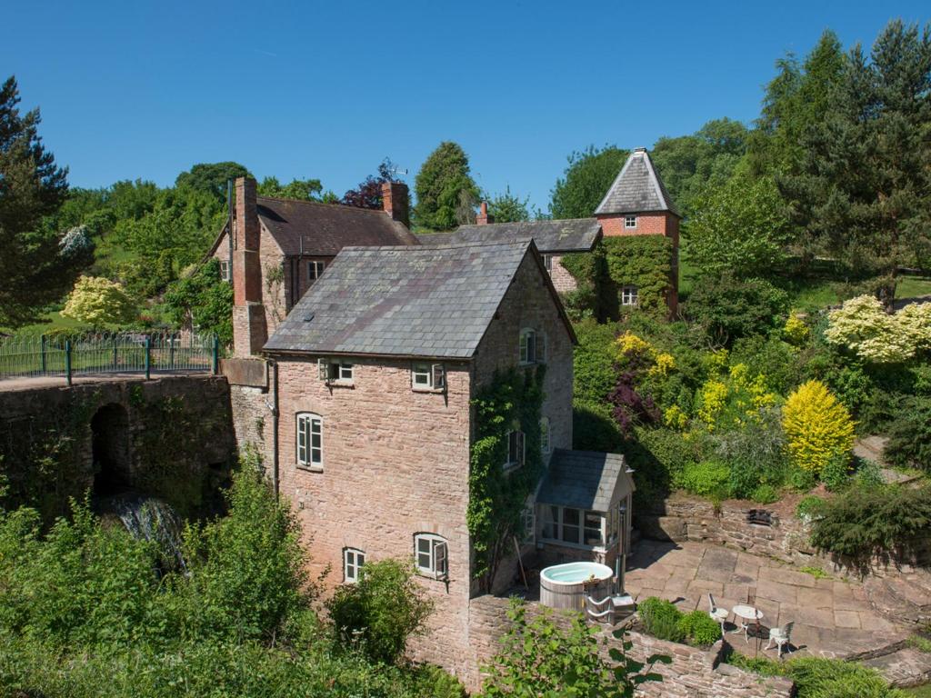 an aerial view of an old brick house at Mill Cottage in Tenbury
