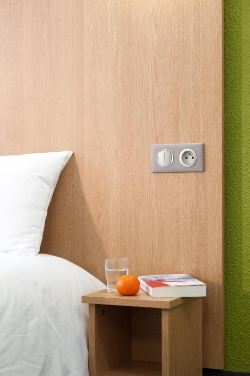 Postel nebo postele na pokoji v ubytování B&B HOTEL Nîmes Ville Active, parking sécurisé gratuit