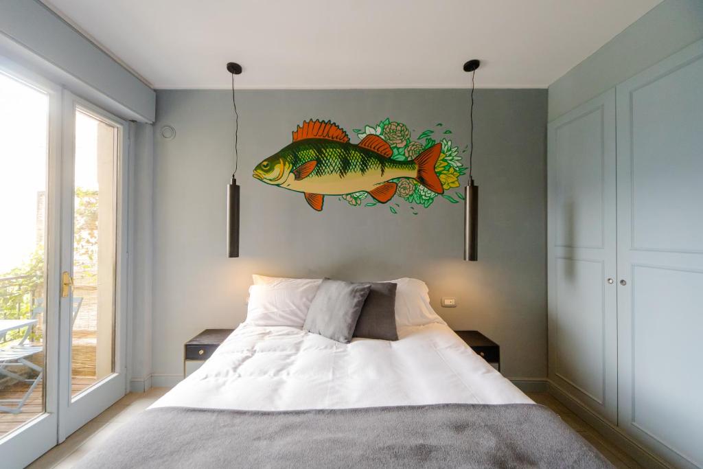 Uma cama ou camas num quarto em Bello!Lake Como Suites