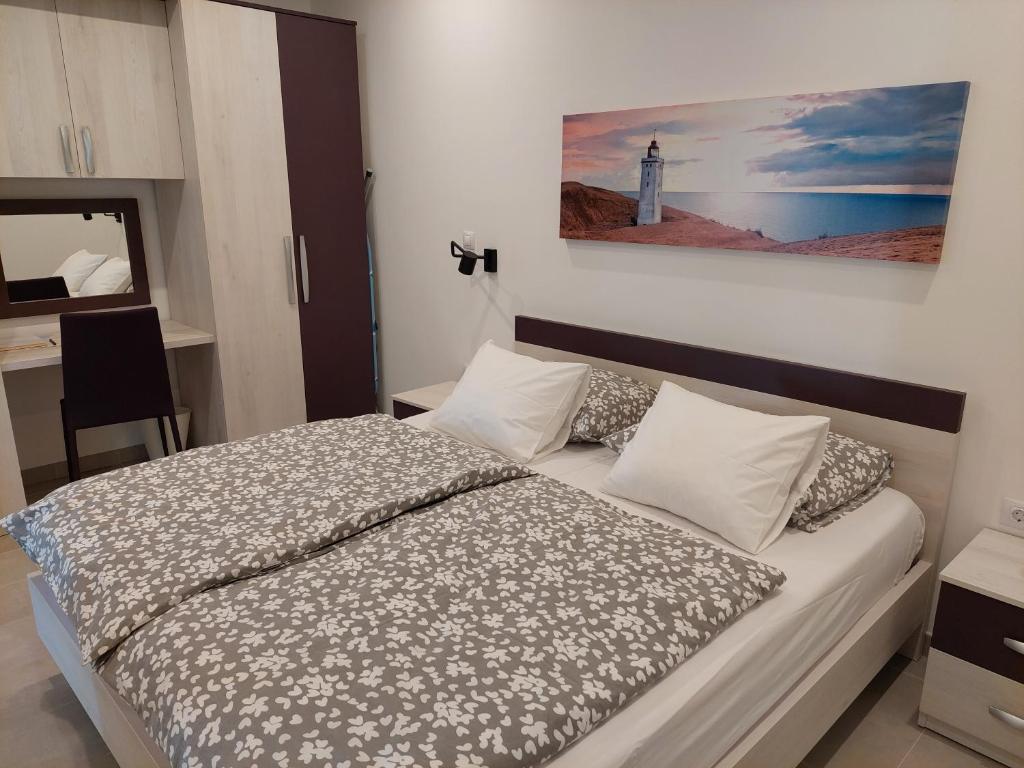 Postel nebo postele na pokoji v ubytování Gavza Sky View Apartment