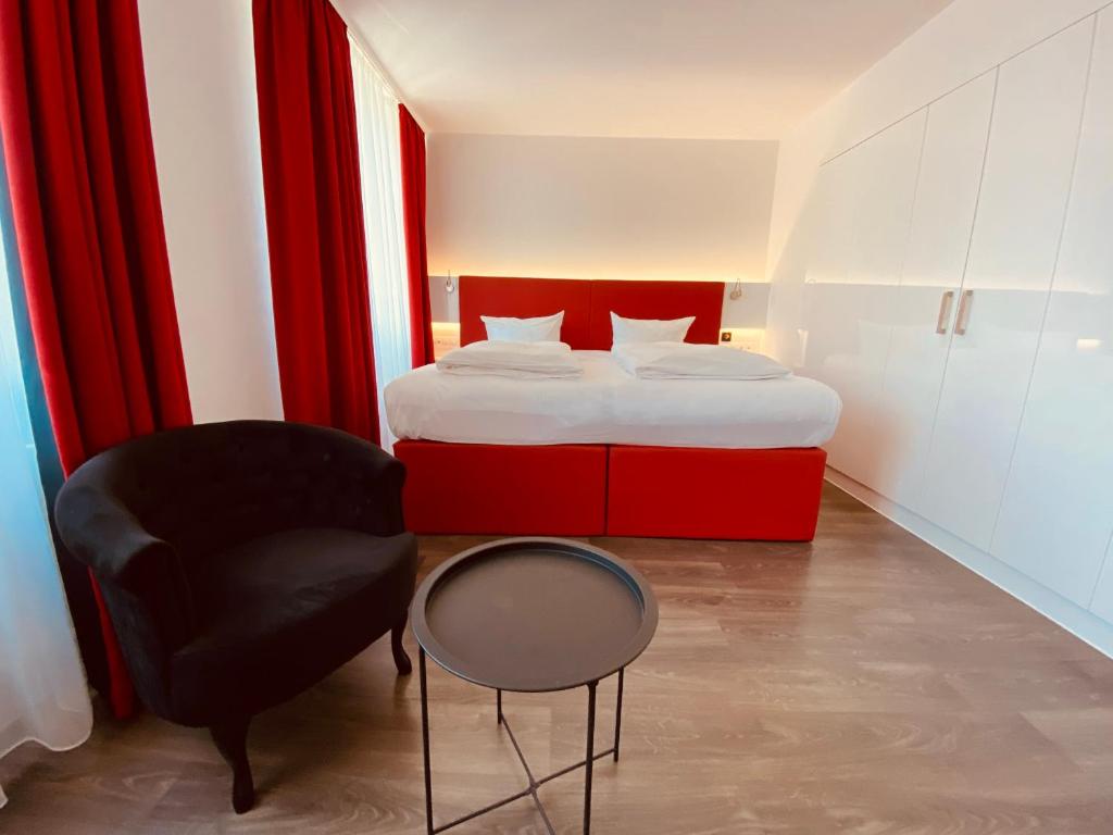 Postel nebo postele na pokoji v ubytování DORMERO Hotel Dresden City