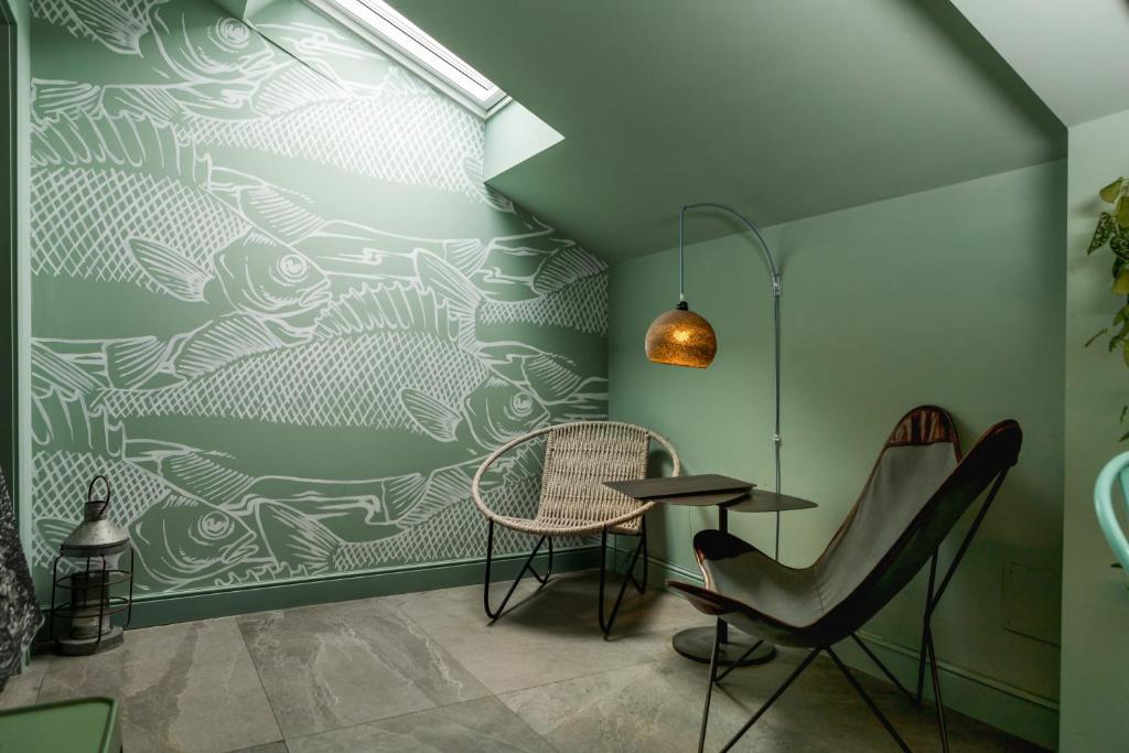 Uma área de estar em Bello!Lake Como Suites