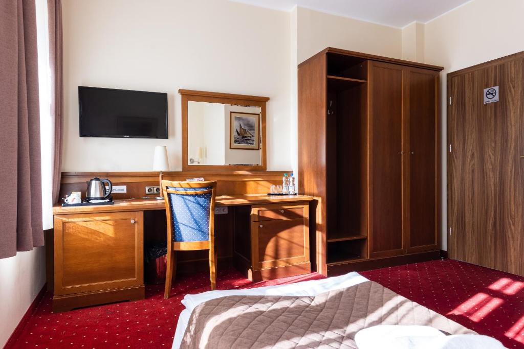Posteľ alebo postele v izbe v ubytovaní Hotel Diamond w Białym Dworku
