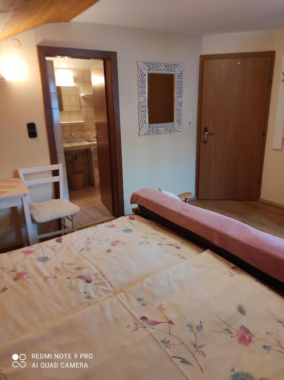 Postel nebo postele na pokoji v ubytování Haus Mühlenheim
