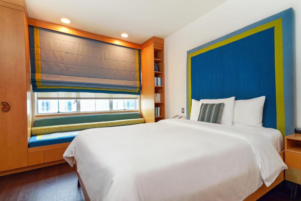 Postel nebo postele na pokoji v ubytování The Tony Hotel South Beach