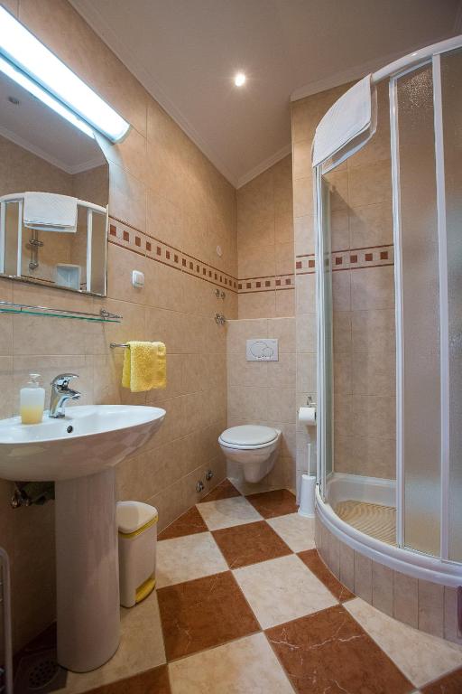 Koupelna v ubytování Apartments Benussi