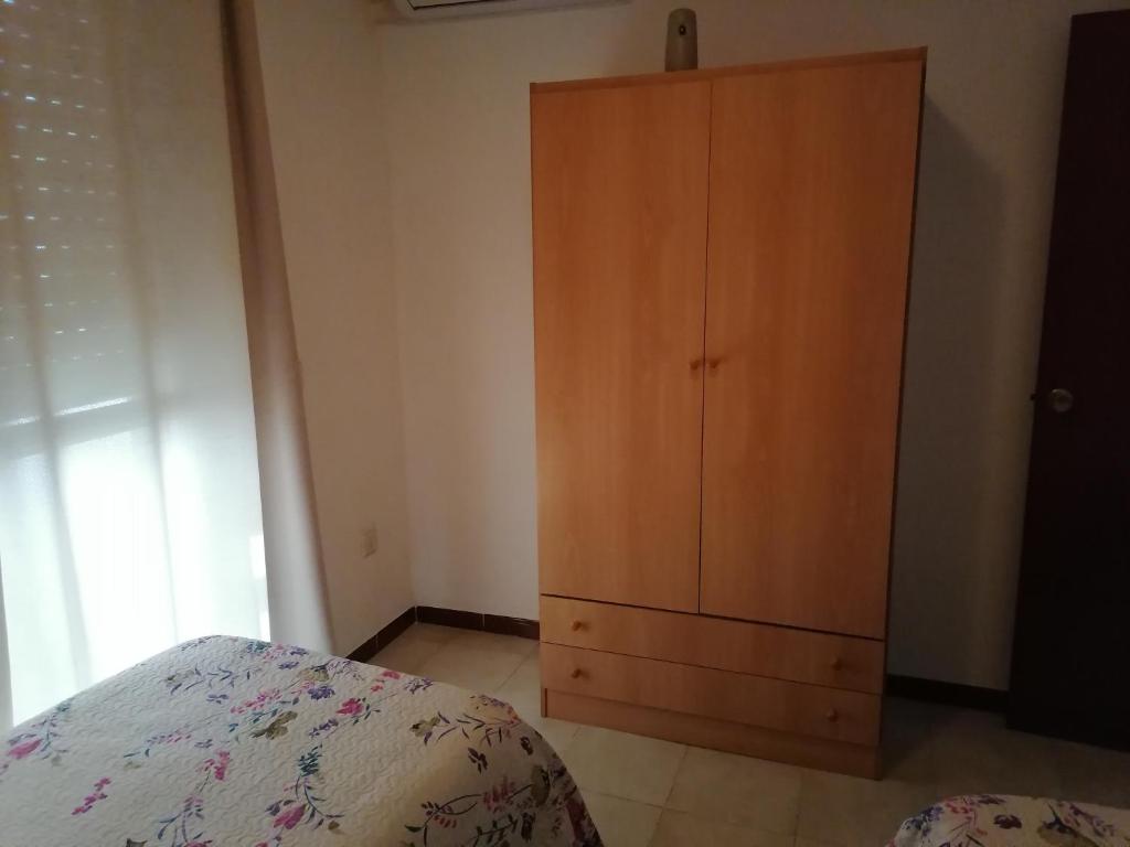 Posteľ alebo postele v izbe v ubytovaní Apartamento Cayetano