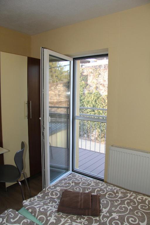 Postel nebo postele na pokoji v ubytování Apartmany Hujer
