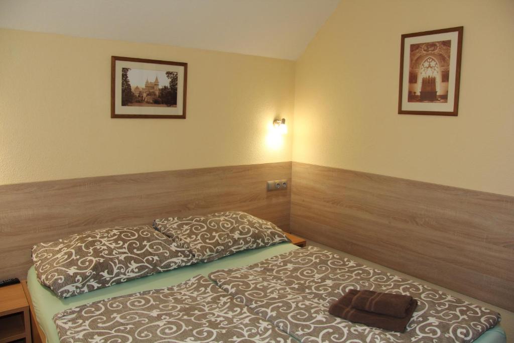 Postel nebo postele na pokoji v ubytování Apartmany Hujer
