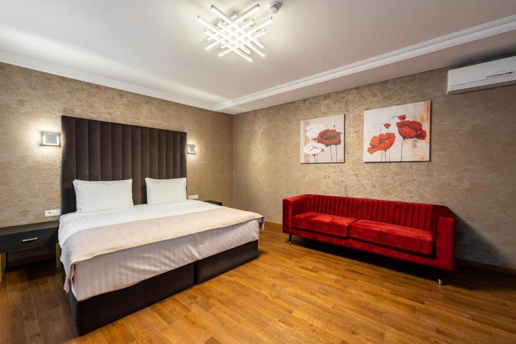 Säng eller sängar i ett rum på Old Riga Plaza Hotel