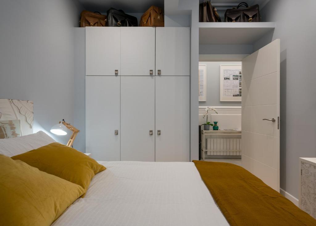 Postel nebo postele na pokoji v ubytování L' ATELIER DEL ARRIAGa