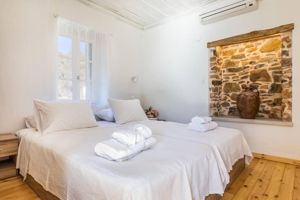
Ένα ή περισσότερα κρεβάτια σε δωμάτιο στο Villa Ambeli

