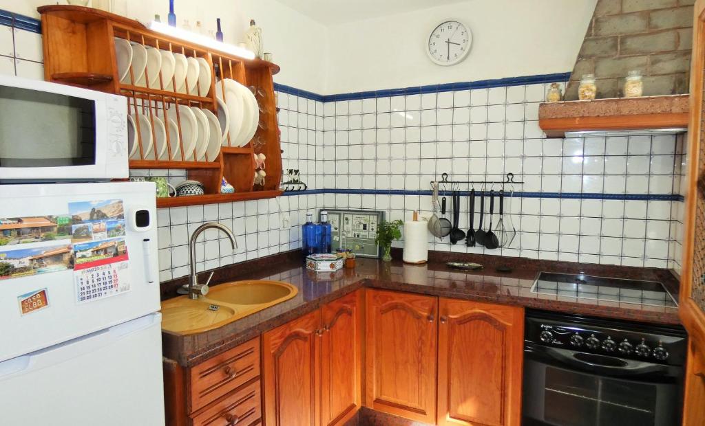 Kuchyň nebo kuchyňský kout v ubytování Casa Elba