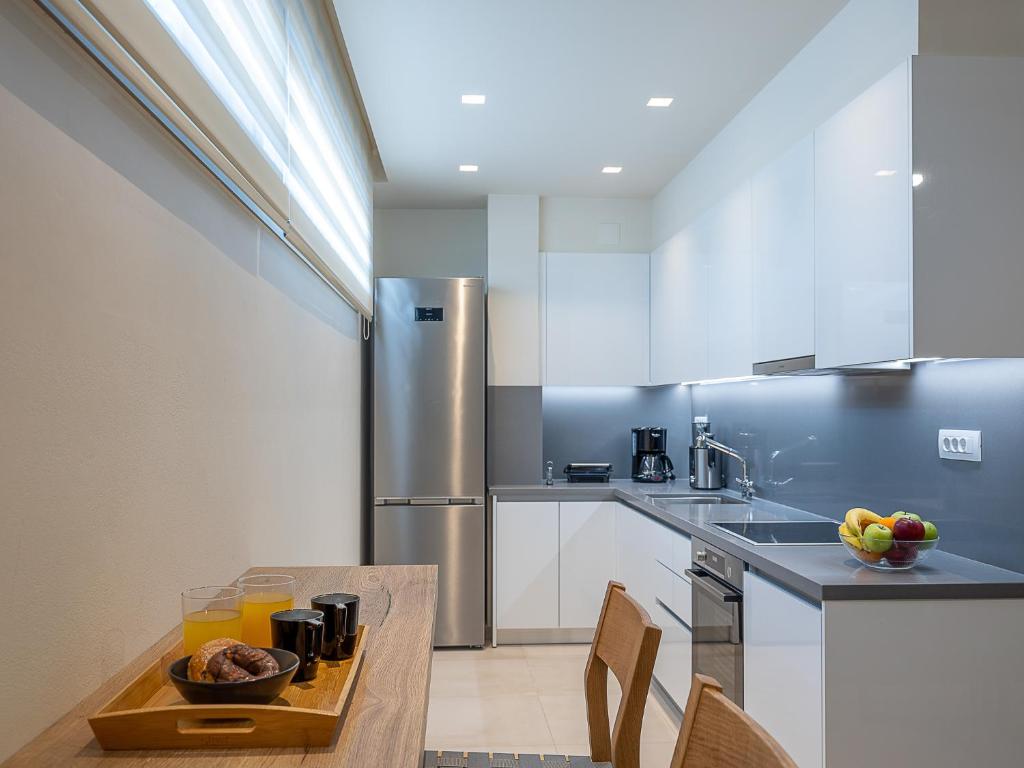 Kuchyň nebo kuchyňský kout v ubytování Utopia Luxury Villas