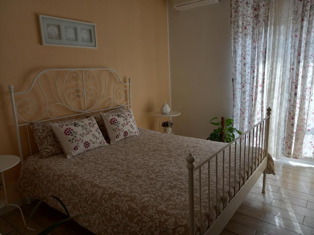 Salerno Inn B&B tesisinde bir odada yatak veya yataklar