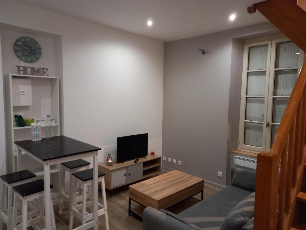 TV a/nebo společenská místnost v ubytování Insolite duplex