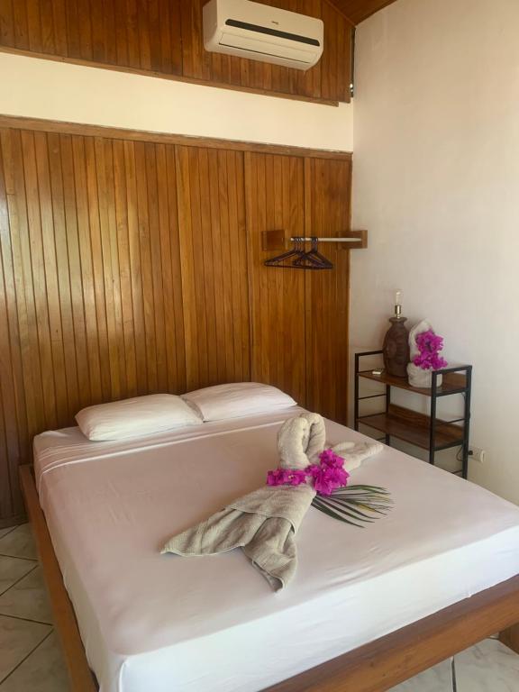 Кровать или кровати в номере Beach Front Bahia