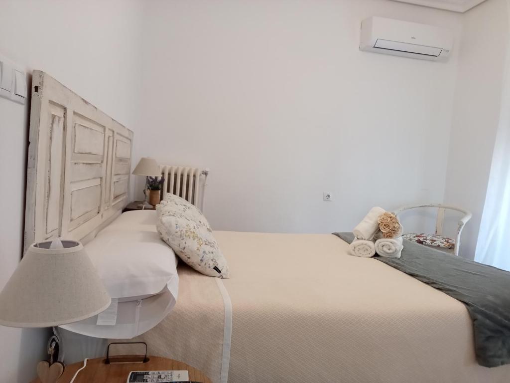 Postel nebo postele na pokoji v ubytování Mirador de Zocodover