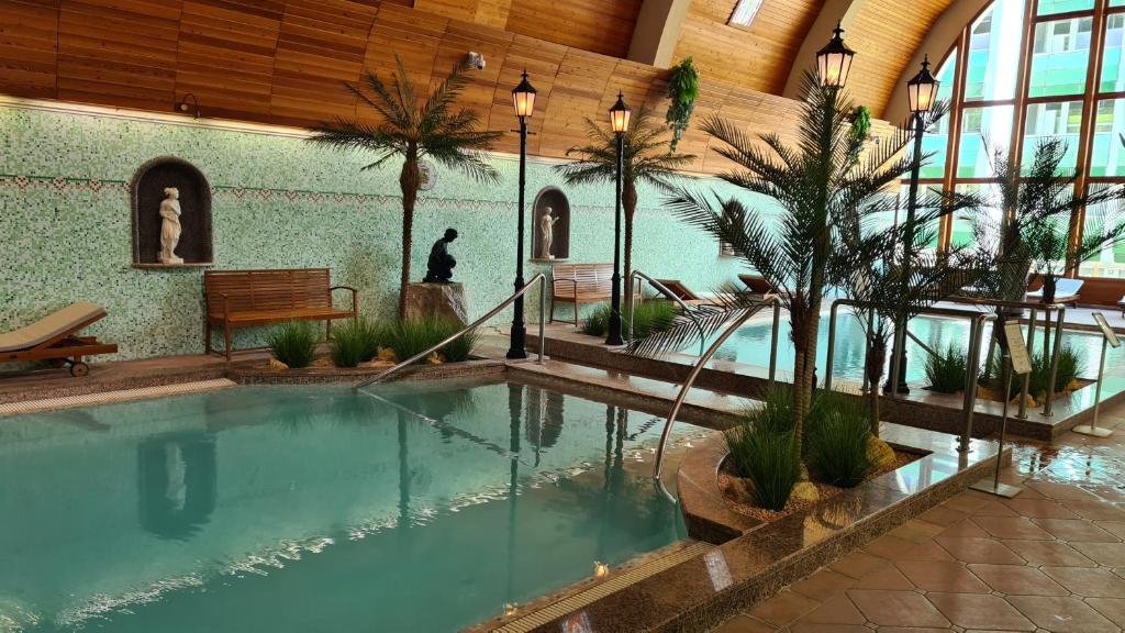 Bazén v ubytovaní Spa Residence Carbona 101, 307 Apartman alebo v jeho blízkosti