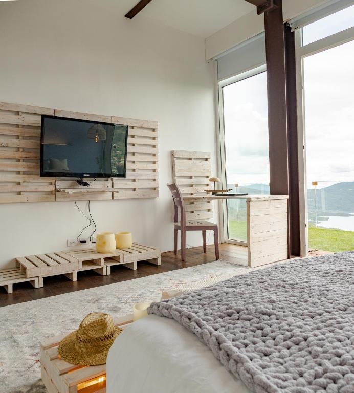 TV a/nebo společenská místnost v ubytování Sukha Resort