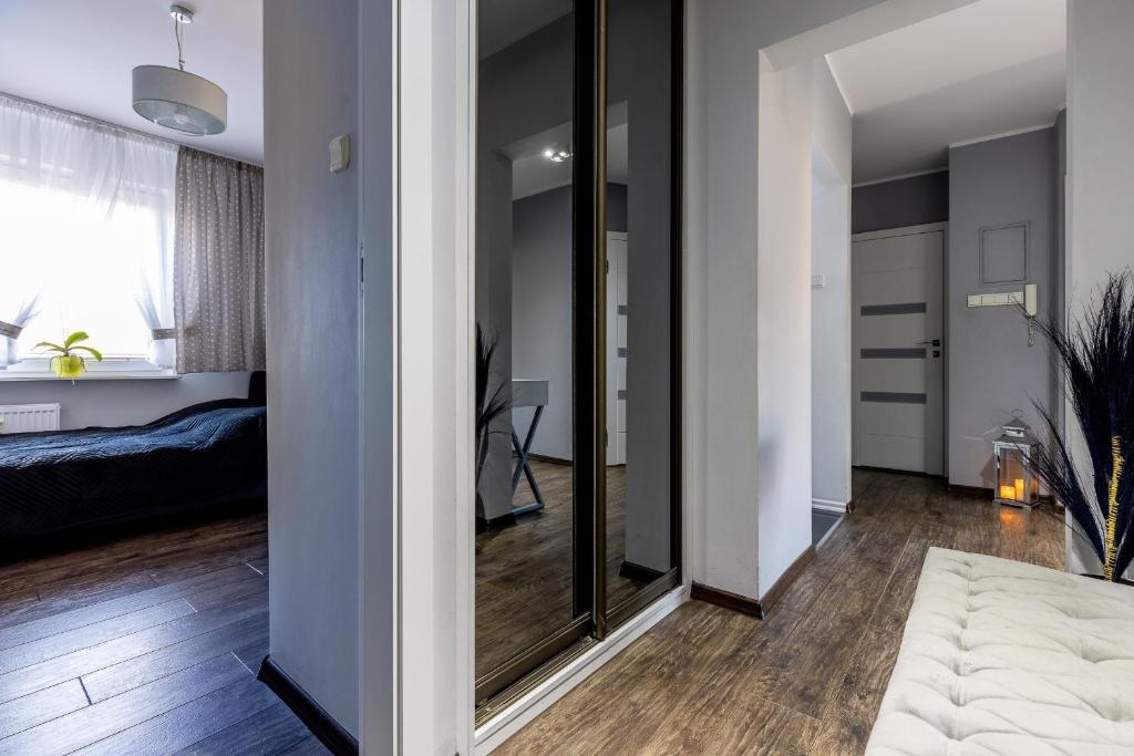 Posteľ alebo postele v izbe v ubytovaní Apartament SunForYou 2