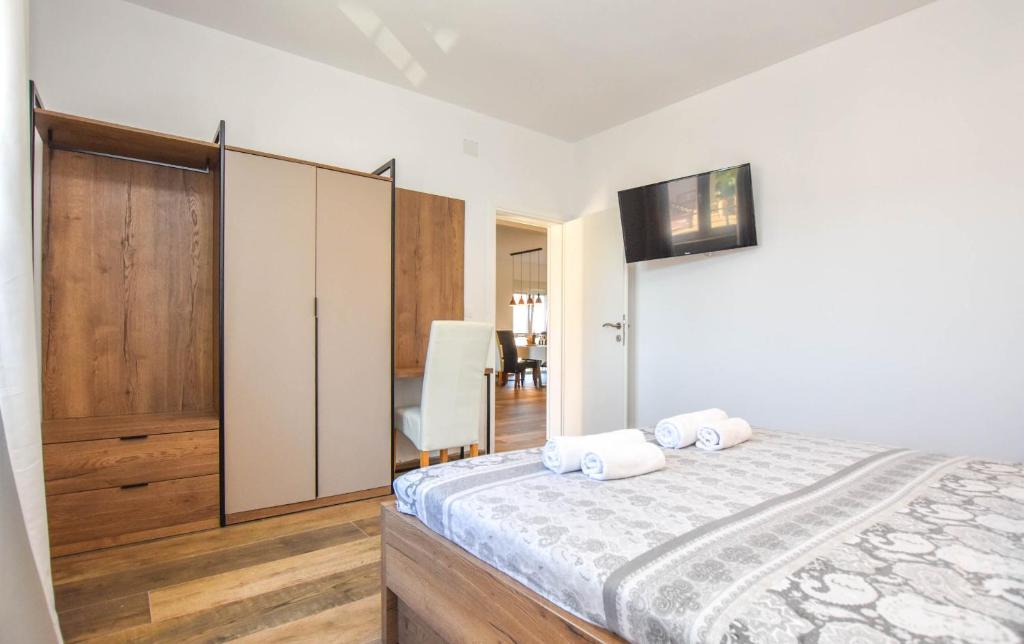 Łóżko lub łóżka w pokoju w obiekcie Apartment Sterna