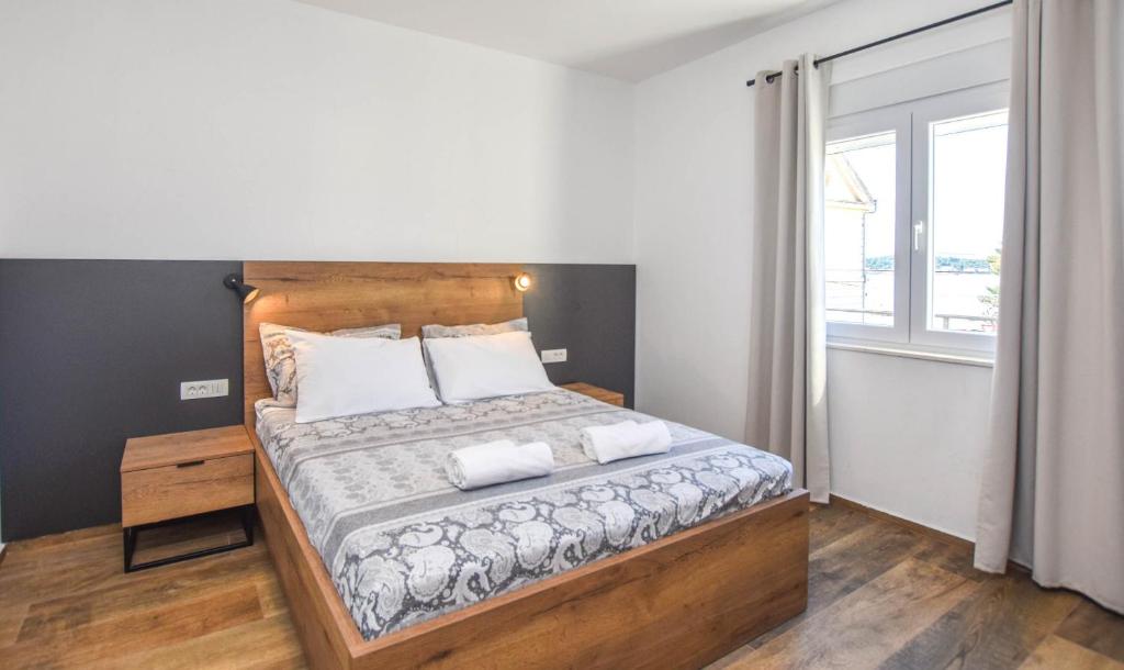 Łóżko lub łóżka w pokoju w obiekcie Apartment Sterna